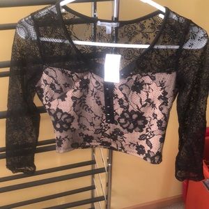 Black lace and beige crop top. NWT